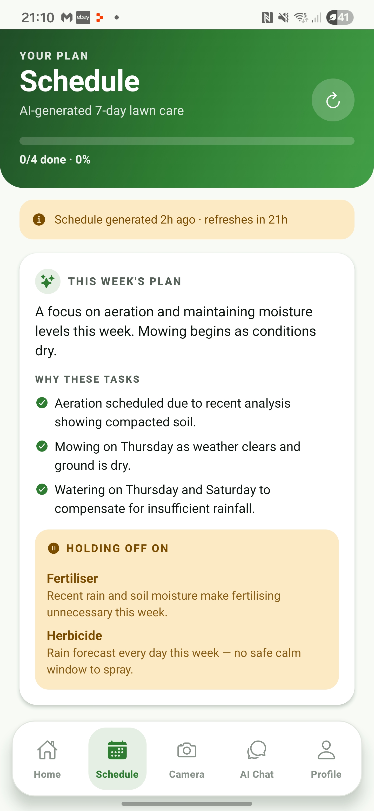 The YardIQ app showing a 7-day AI-generated lawn care schedule